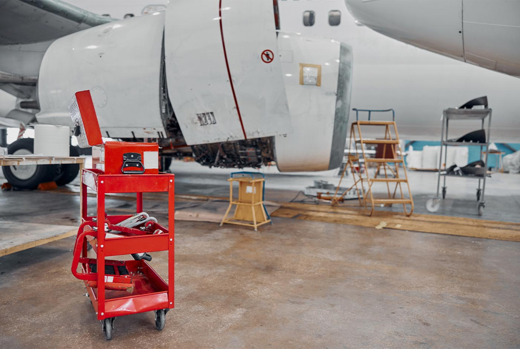 About Us 3 red mechanic cart with tools in aviation