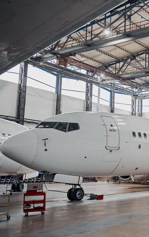 The Aircraft Mechanic Profession 1 front nose of aircraft inside airport